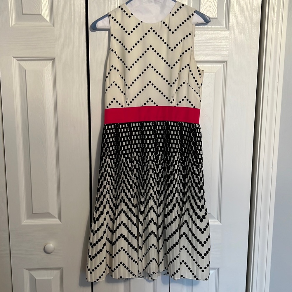 Formal dress with pink ribbon